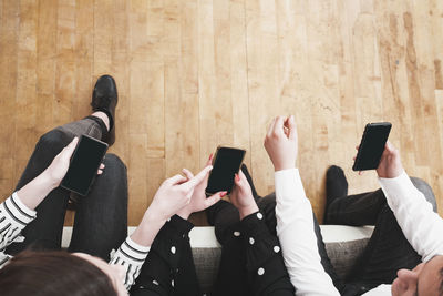 Group of people using mobile phone