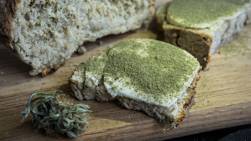 High angle view of bread on cutting board