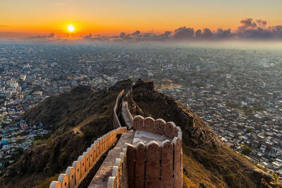 High angle view of city during sunset