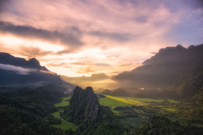 Scenic view of mountains against sky during sunset