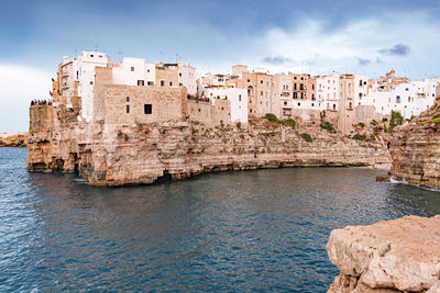 Polignano a mare. town on the cliffs, puglia region, italy, europe. traveling concept background 