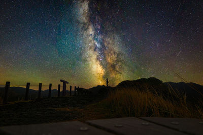 Scenic view of star field against sky at night