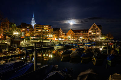 Illuminated buildings in city at night