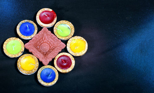 High angle view of multi colored candies on table