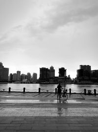 Man riding bicycle in city