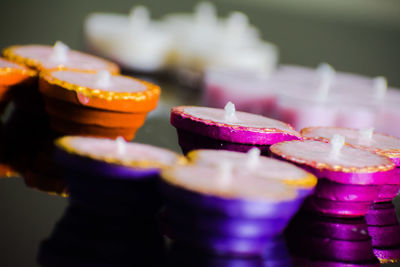 Close-up of multi colored candies on table