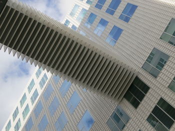 Low angle view of skyscraper against sky