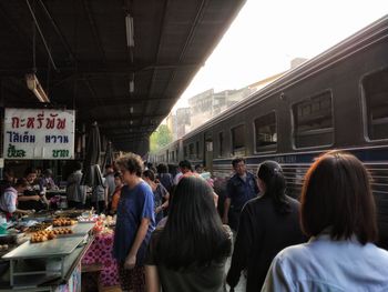 People at market in city