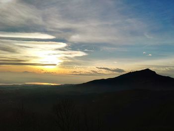 Scenic view of landscape against sky during sunset