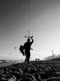 Full length of woman jumping on landscape