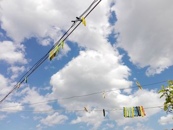 Low angle view of white clouds and sky