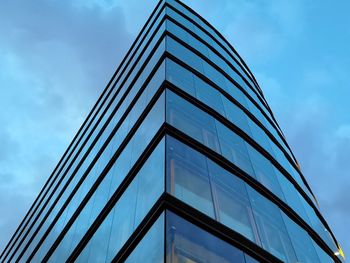 Low angle view of modern building against sky