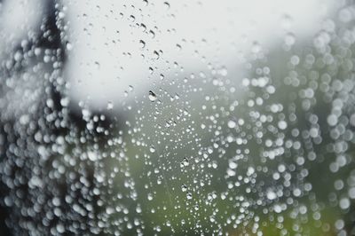 Full frame shot of wet window in rainy season