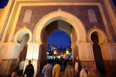 People walking under bab boujloud