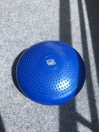 High angle view of blue text on street