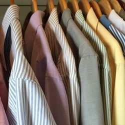 Close-up of shirts hanging in closet