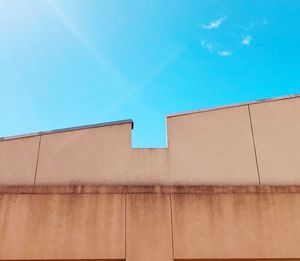 Low angle view of building against blue sky