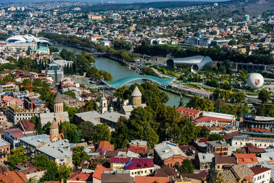 Tbilisi cityscape from hilltop of mtatsminda mountain, travel card