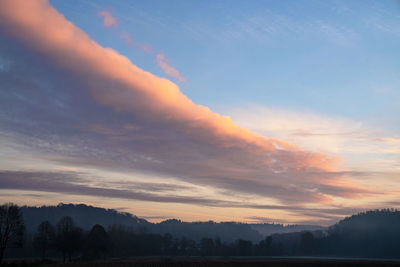 Early morning sky with pastel-colored clouds