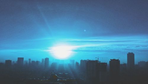 View of skyscrapers at sunset