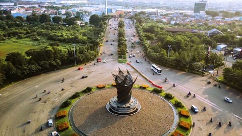 High angle view of statue on street in city