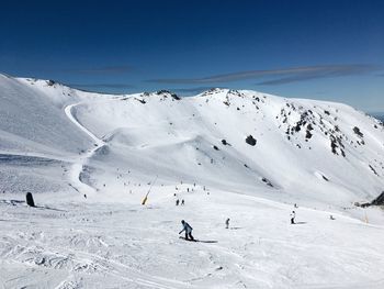 Scenic view of snowcapped mountain against sky