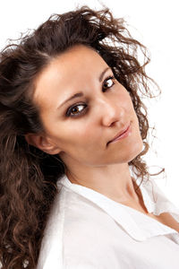 Portrait of a beautiful young woman over white background