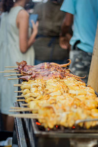 Midsection of woman preparing food