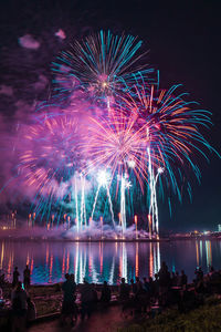Firework display at night