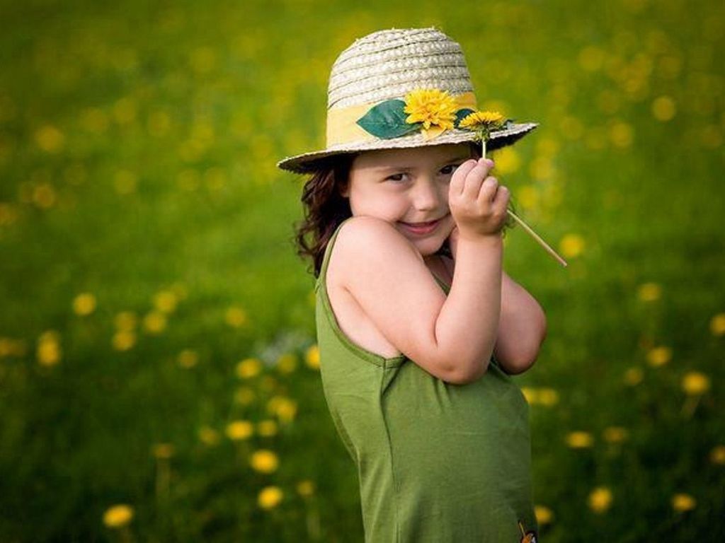 person, lifestyles, leisure activity, casual clothing, childhood, three quarter length, elementary age, standing, focus on foreground, front view, holding, young adult, waist up, girls, field, smiling, grass, happiness