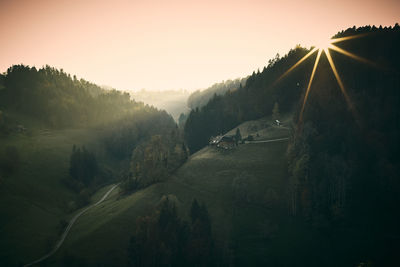 Scenic view of mountains against sky during sunset