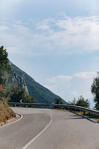 Empty road against sky