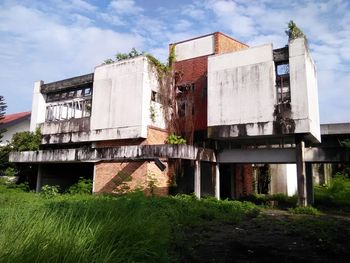 Abandoned building against sky