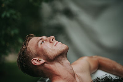 Close-up of man looking up