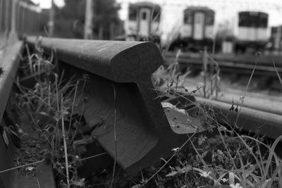 Close-up of abandoned truck on field