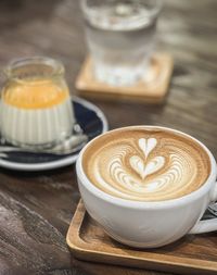 Close-up of cappuccino on table