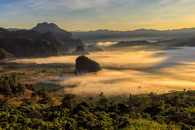 Scenic view of mountains against sky during sunset