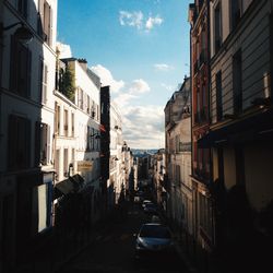 Street in city against sky