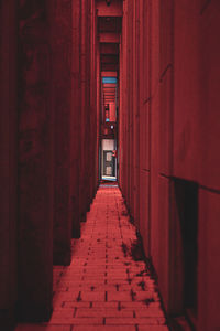 Narrow illuminated corridor of building