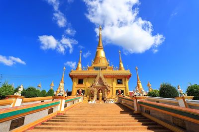 View of temple building against blue sky