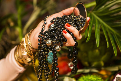 Close-up of woman holding hands