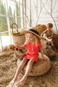 Easter kids playing with rabbits and ducks