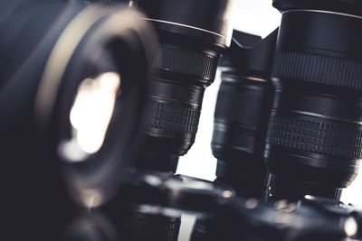 Close-up of cameras on table