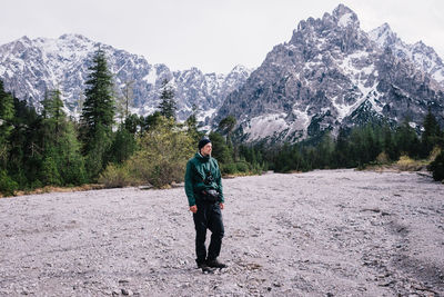 Full length of man standing on mountain