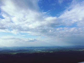 Scenic view of landscape against blue sky