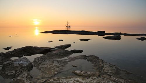 Scenic view of sunset over sea