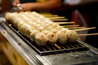 Close-up of sushi on barbecue grill