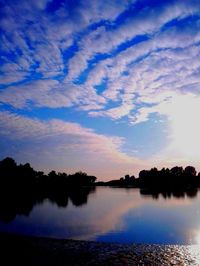 Reflection of clouds in calm lake