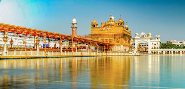 Reflection of building in water harmandir sahib