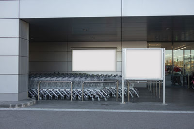 Empty chairs and tables in building